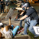 Police officers arrest a demonstrator on Aug. 18, 2014, in Ferguson, Mo.
Joe Raedle/Getty Images